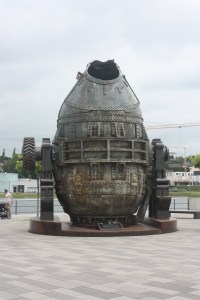 A monument to the city's past, one of the last canisters used to pour steel, sits at the water's edge.