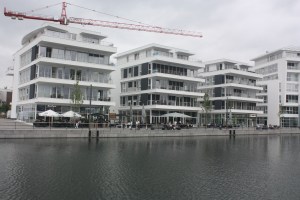 Ground floor restaurants with offices and housing above.