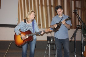Carolyn Arends and mandolin player Spencer Capier do their sound check.